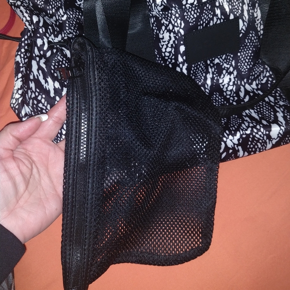 BEBE Sport Becca Large Duffel
Black/White Snake Pr - Picture 7 of 8